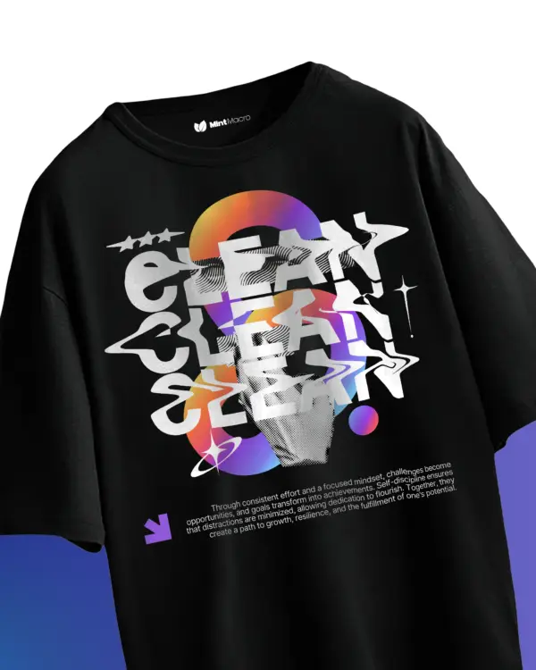 Oversized T-shirt laid flat featuring the word 'Clean' in modern typography, with a contemporary color scheme, displayed on a neutral background