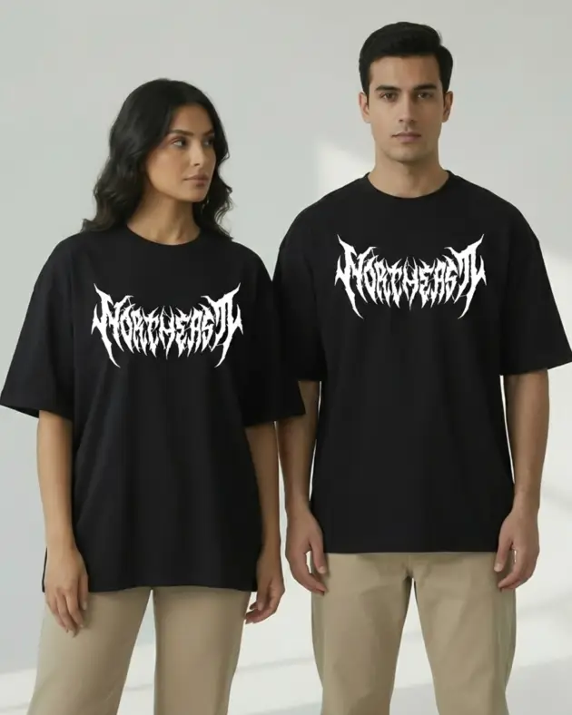 Mint Macro Northeast oversized black t-shirt with white metal gothic font graphic worn by man and woman – unisex streetwear Pakistan