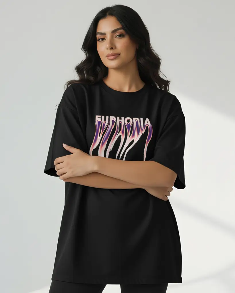 A woman wearing an oversized black t-shirt with a "Euphoria" graphic in a dripping, liquid-melt font style with purple and pink gradients.